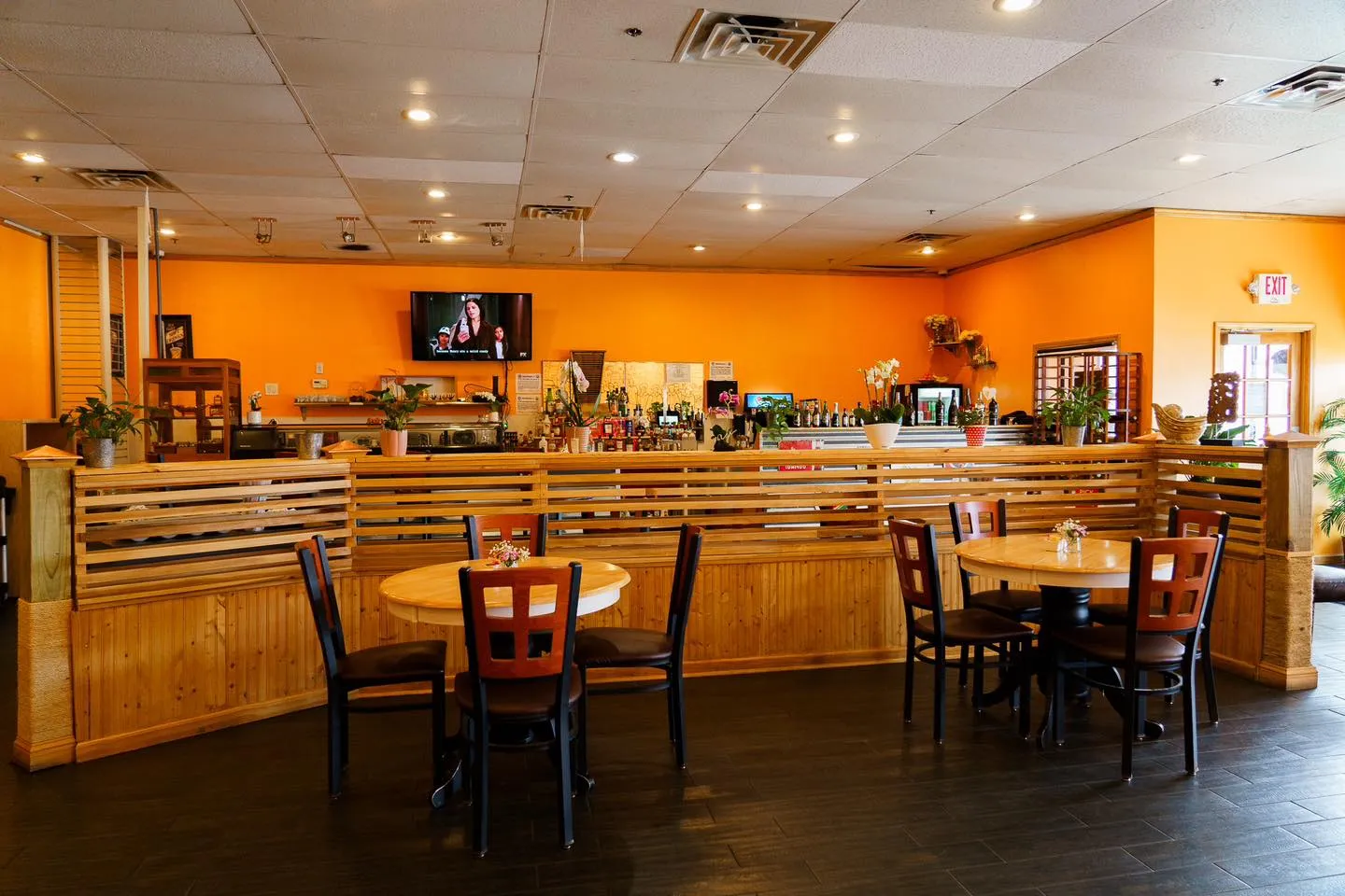 Dining room and wood-slat bar at Pin Toh Asian